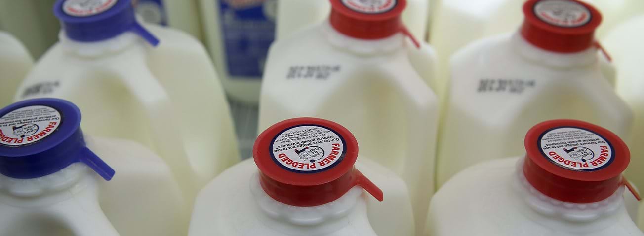 Photo of tops of milk containers