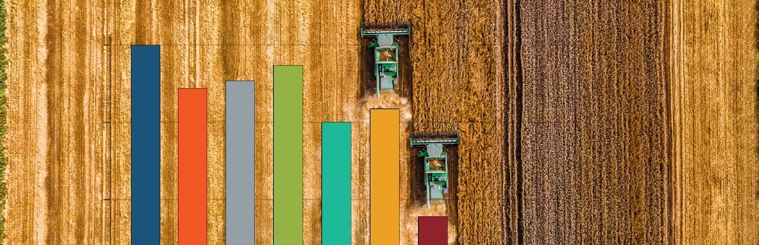 Tractors in a plowed field represents the bars of a chart.