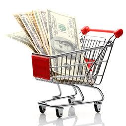 Shopping cart with money bills